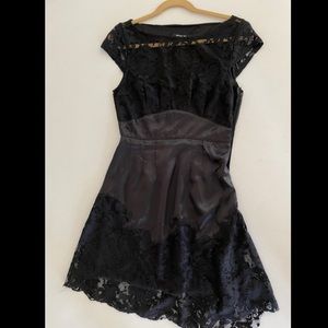 Black silky dress with lace detail. Elegant & edgy
